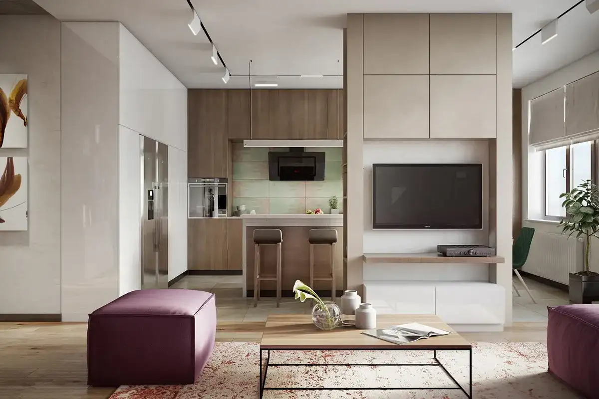 Nowoczesne oświetlenie szynowe aranżacje w salonie z aneksem kuchennym. Wygodna sofa, stolik kawowy i wyspa kuchenna.