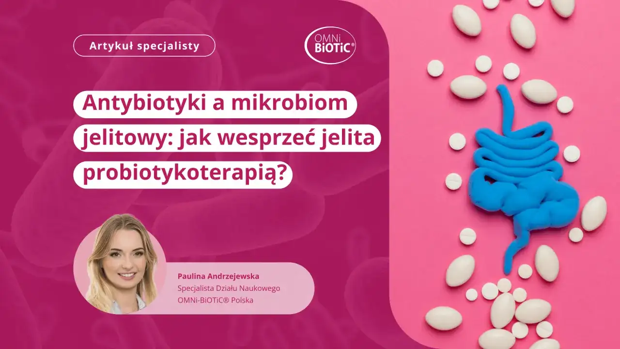 Model jelit z plasteliny otoczony tabletkami, na tle różowym i różowych bakterii.