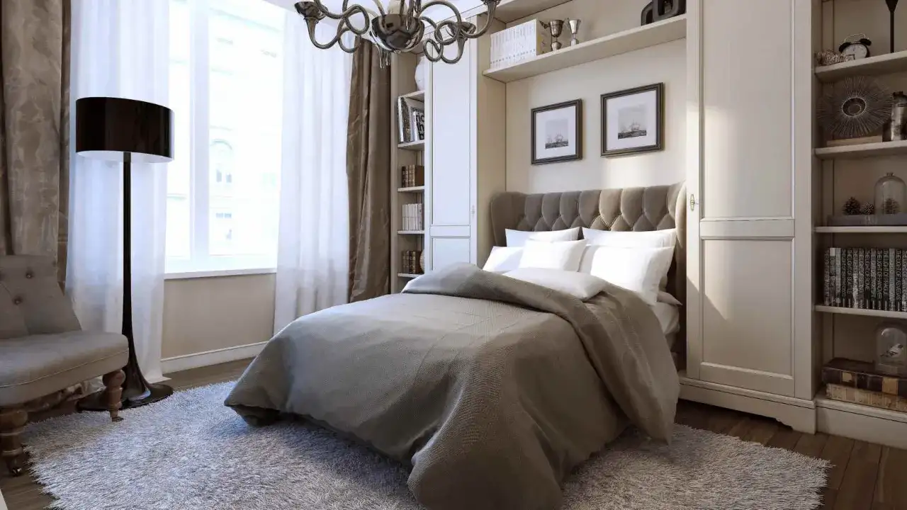 Elegancka sypialnia z wygodnym łóżkiem i stylowym żyrandolem, który idealnie pasuje do wnętrza.