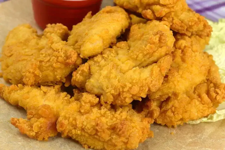 Pyszne polędwiczki drobiowe przepis na soczyste kąski w panierce