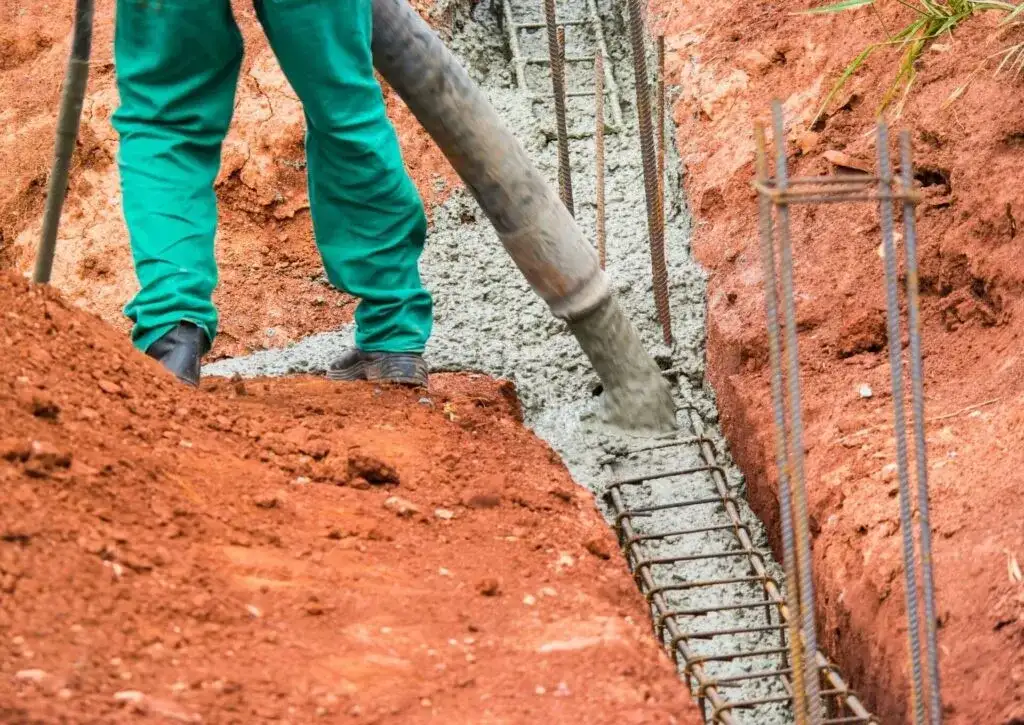 Jak głęboko fundament pod ogrodzenie? Odkryj kluczowe informacje