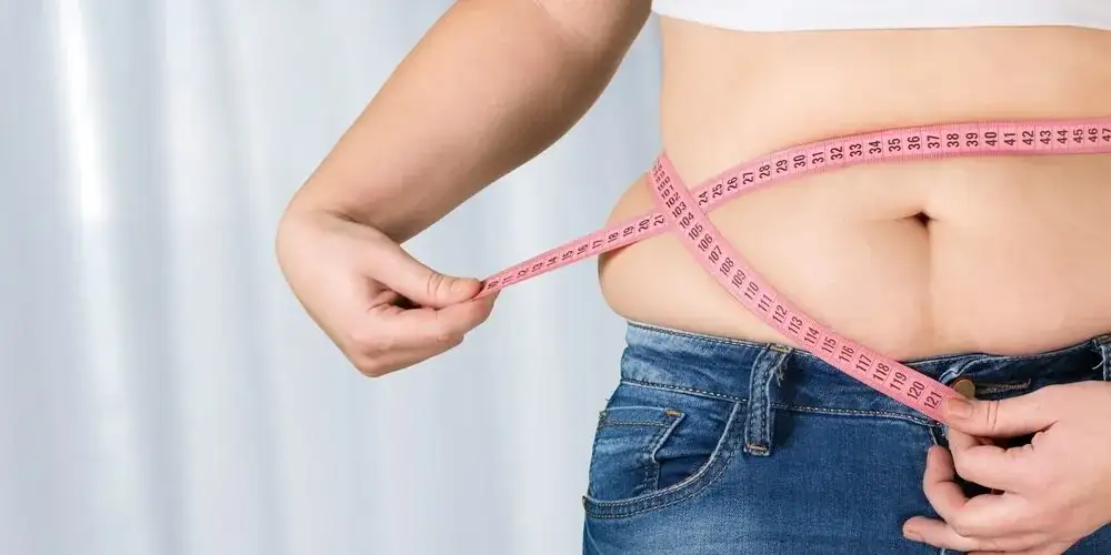 Brzuch jak piłka przyczyny: poznaj najczęstsze powody wzdęć