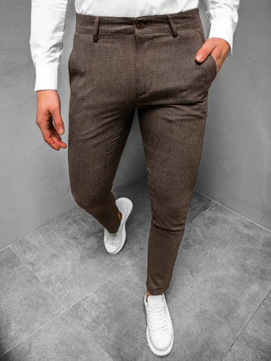 Stylowe brązowe spodnie męskie. Jak nie popełnić modowej wpadki?
