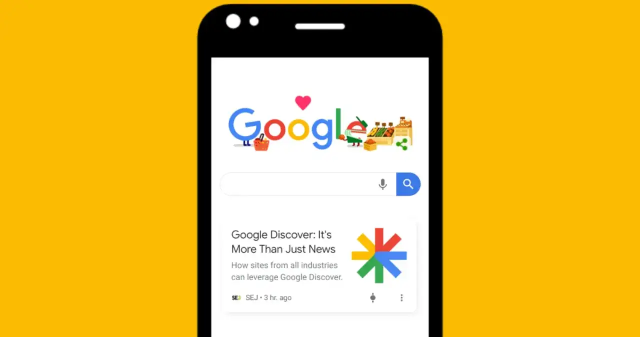 Telefon z wyszukiwarką Google. Na ekranie artykuł "Google Discover: It's More Than Just News", pokazujący możliwości platformy.