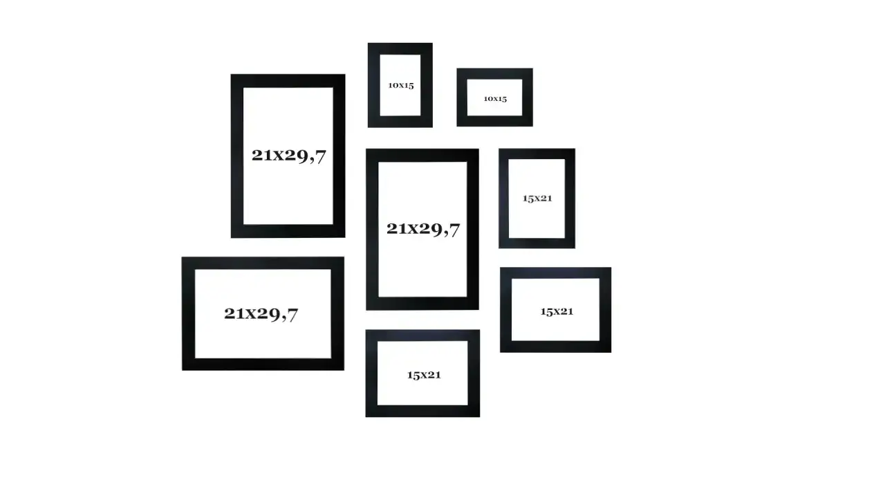 Kolekcja czarnych ram na zdjęcia: trzy 21x29,7, trzy 15x21 i dwa 10x15.