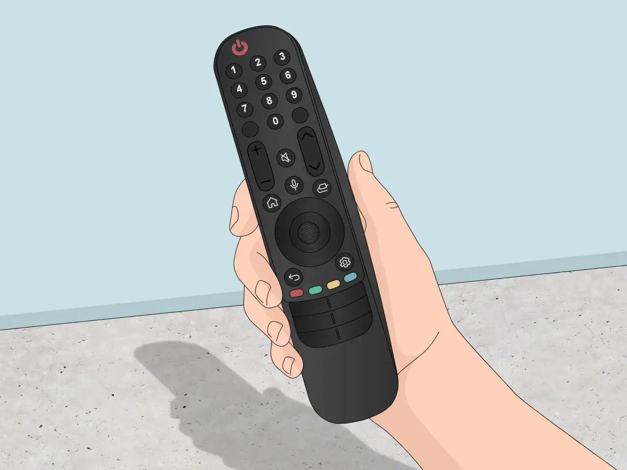 Dłoń trzyma czarny pilot. Może to być pilot do telewizora, który nie działa, bo baterie się wyczerpały.