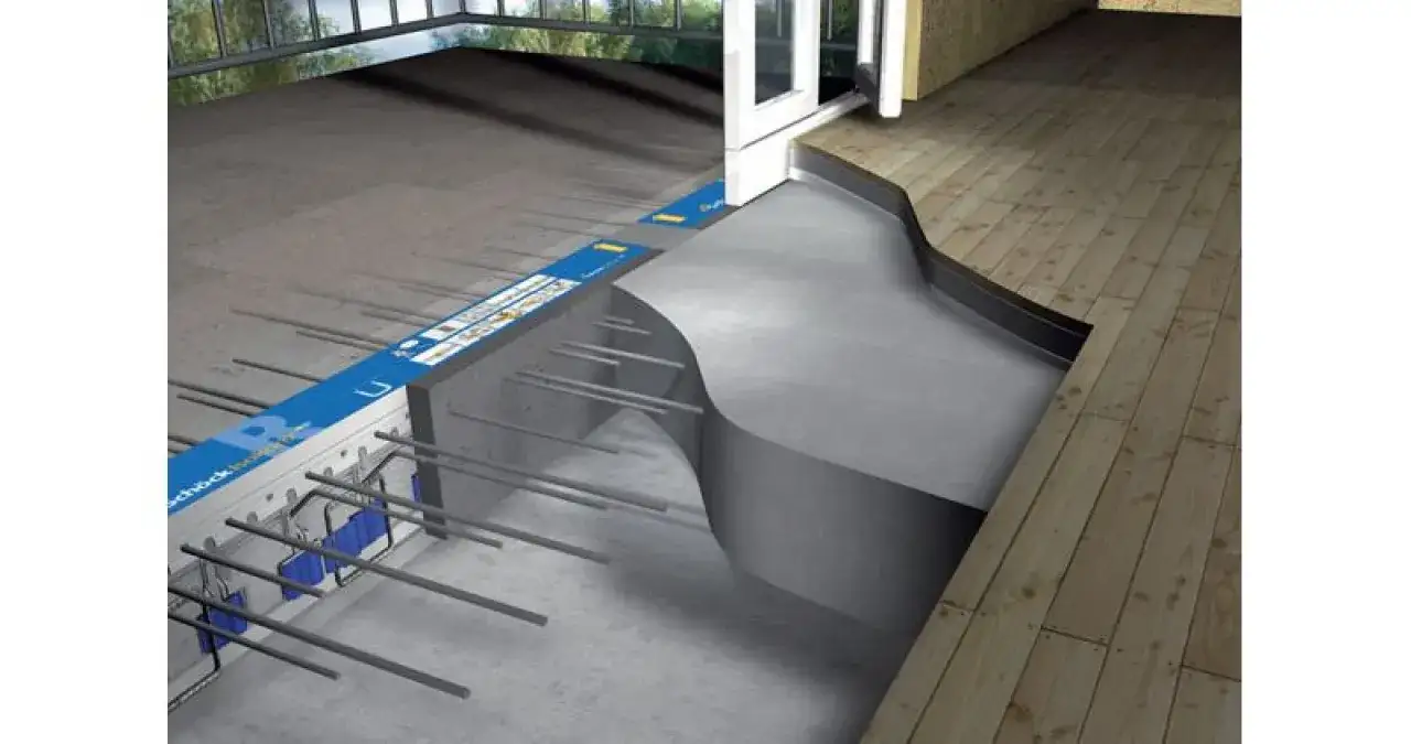 Izolacja termiczna i akustyczna przy budowie balkonu. Widoczny system profili i zbrojenia, jak zazbroić balkon, by był energooszczędny.