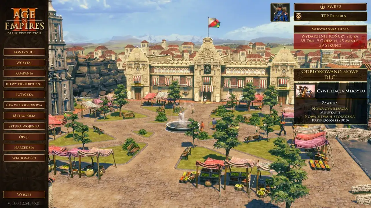 Menu gry Age of Empires 3: Definitive Edition. Widok na plac z budynkiem i straganami. Dostępne spolszczenie.