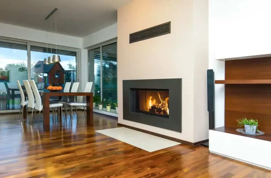 Jak skutecznie ogrzać przestrzeń kominkiem 14 kW na ile metrów?