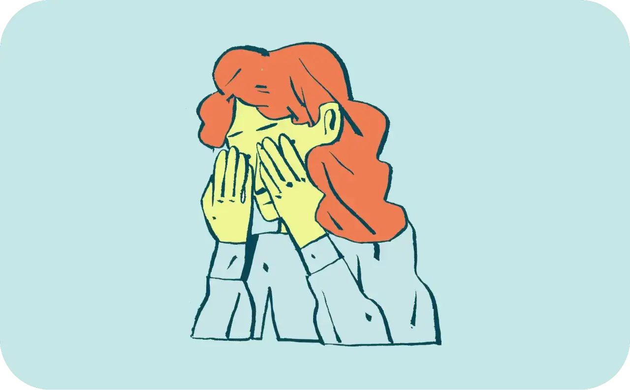 Kobieta z rudymi włosami zakrywa twarz dłońmi, jakby płakała lub była w szoku. To może być wwo test.