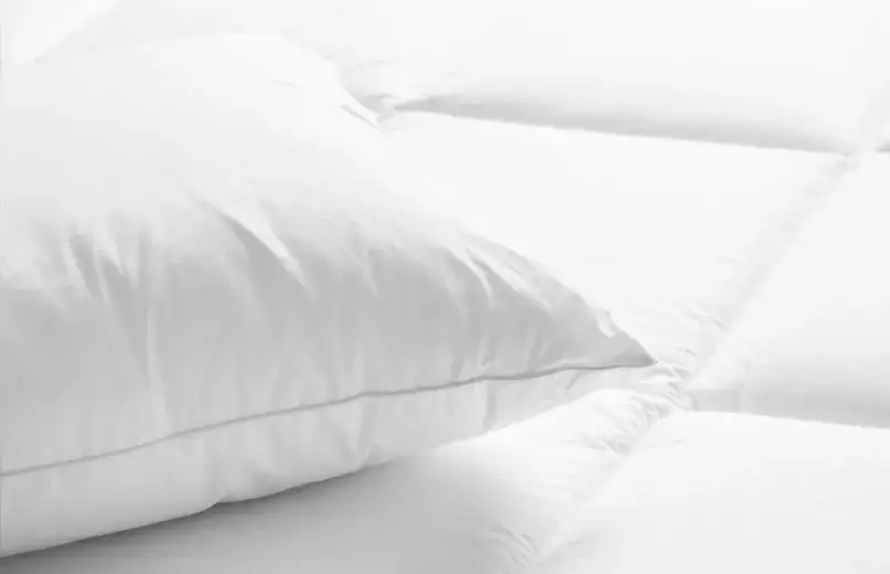 Jakie poduszki są w hotelach? Odkryj komfort snu w podróży