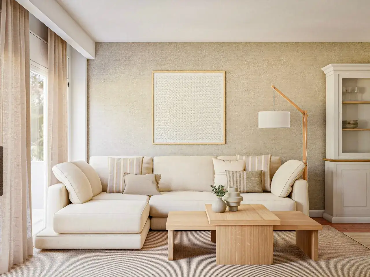 Sofá modular beige, mesa de centro de madera y cuadro decorativo en un salón con estilo cozy.