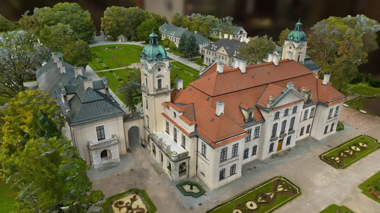 Pałac w Kozłówce z wieżą i oranżerią, otoczony parkiem. Ciekawostki o historii i architekturze tego miejsca czekają na odkrycie.