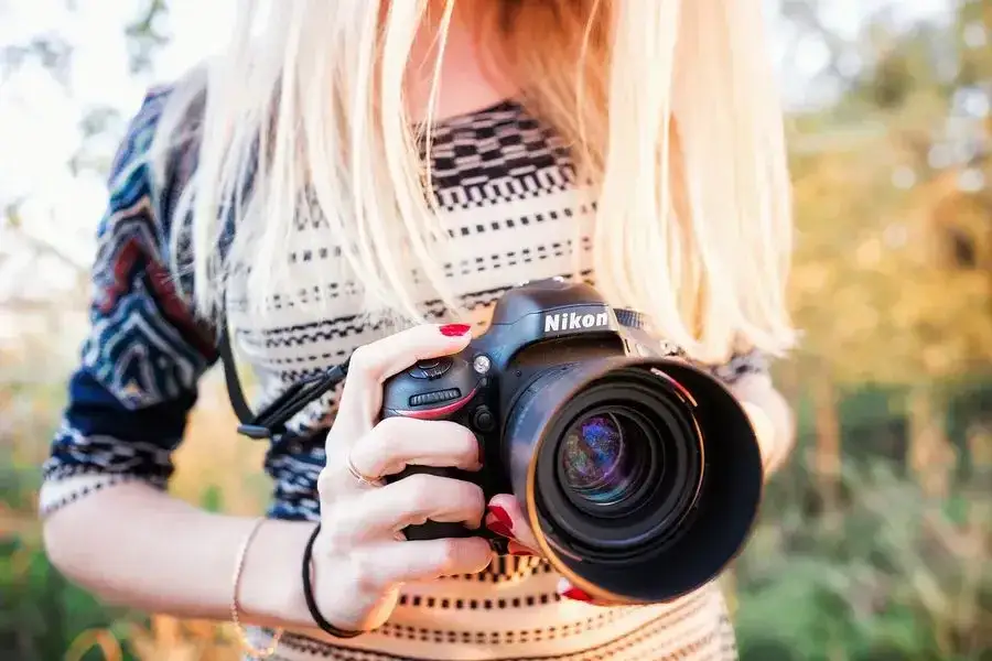 Nikon D7000 with a portrait lens attached