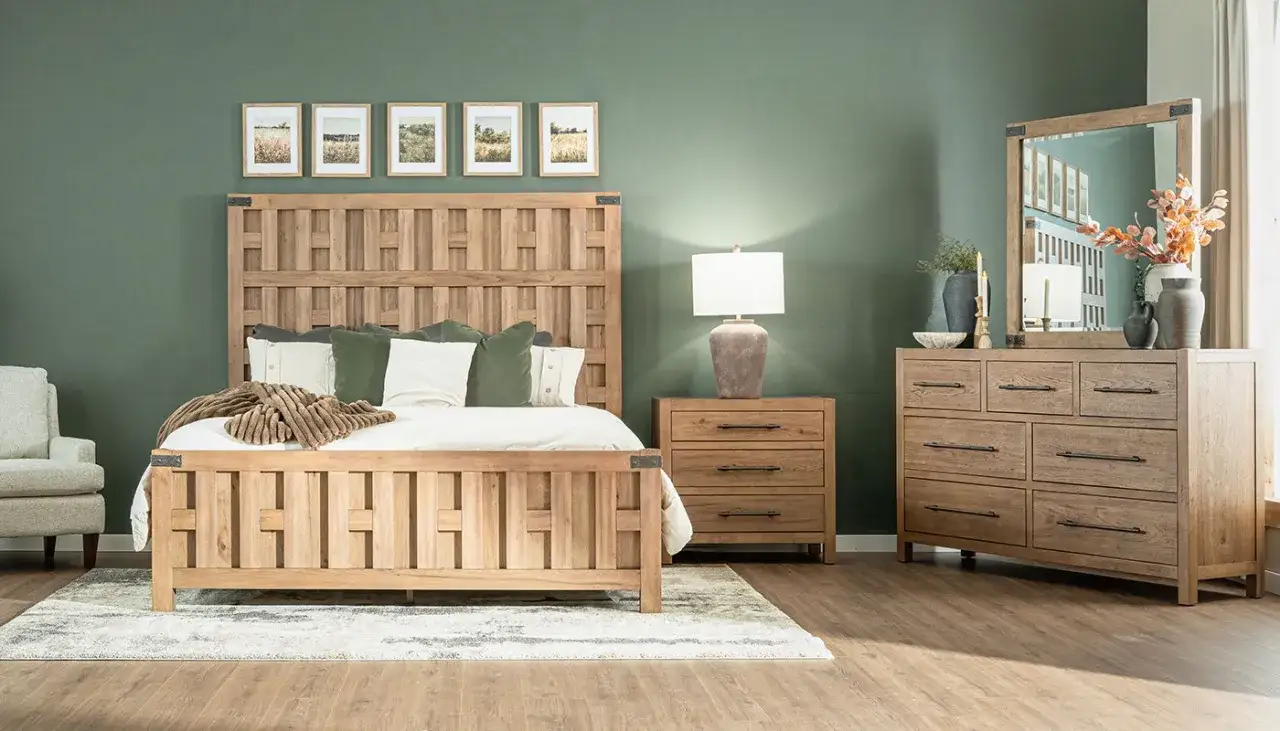 A rustic wooden bedroom set with a bed, nightstand, and dresser. The nightstand appears to be a good size, fitting the average nightstand dimensions for a cozy bedroom.