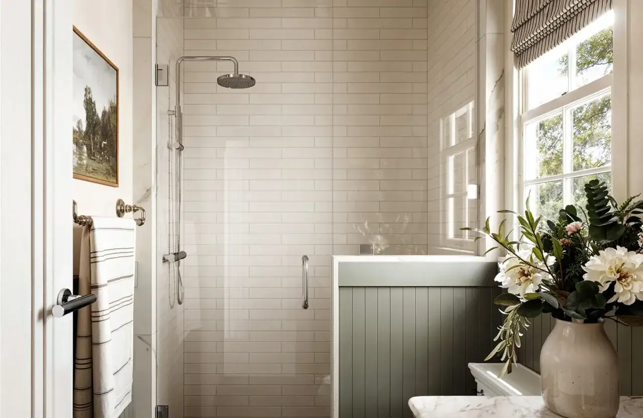 Subtle subway tile creates a clean, modern look for this bathroom shower.