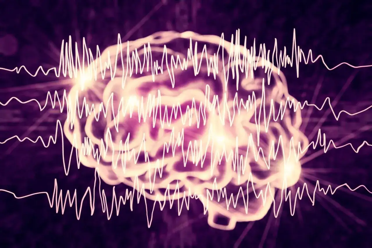 Nienormalne fale mózgowe na tle mózgu, symbolizujące epilepsję.