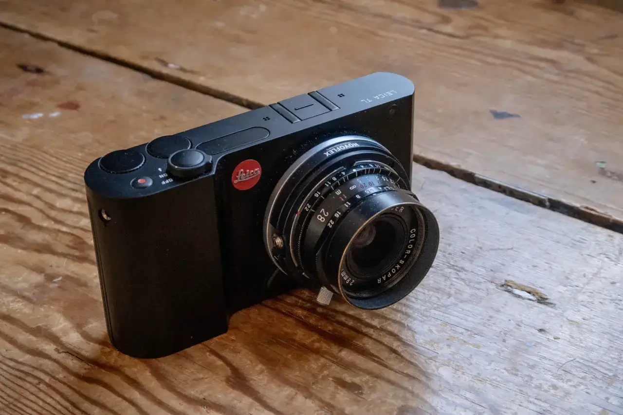 Leica TL camera with a 28mm Color-Skopar lens, perfect for detailed Leica lenses reviews.