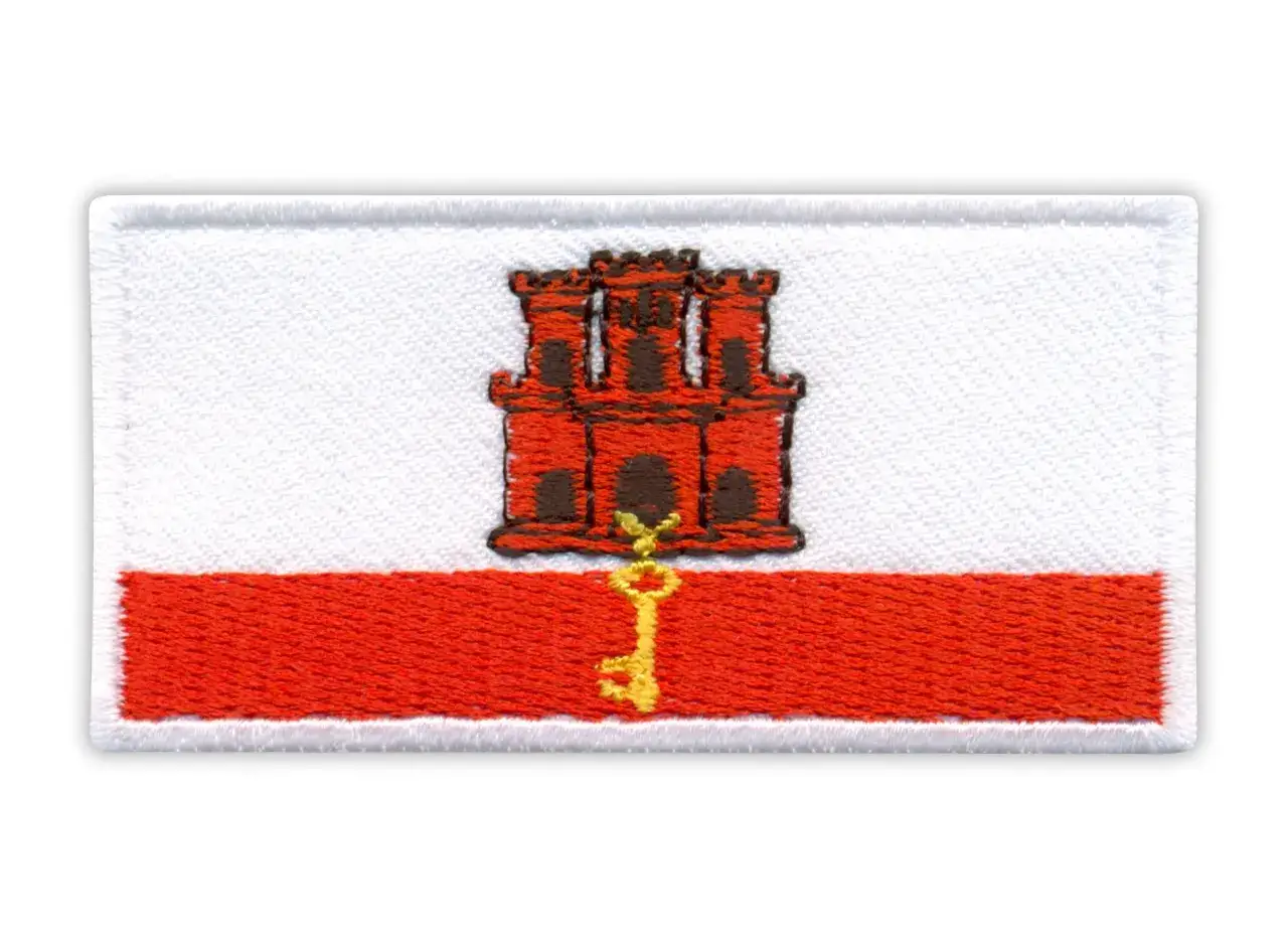 Flaga Gibraltaru z zamkiem i kluczem.