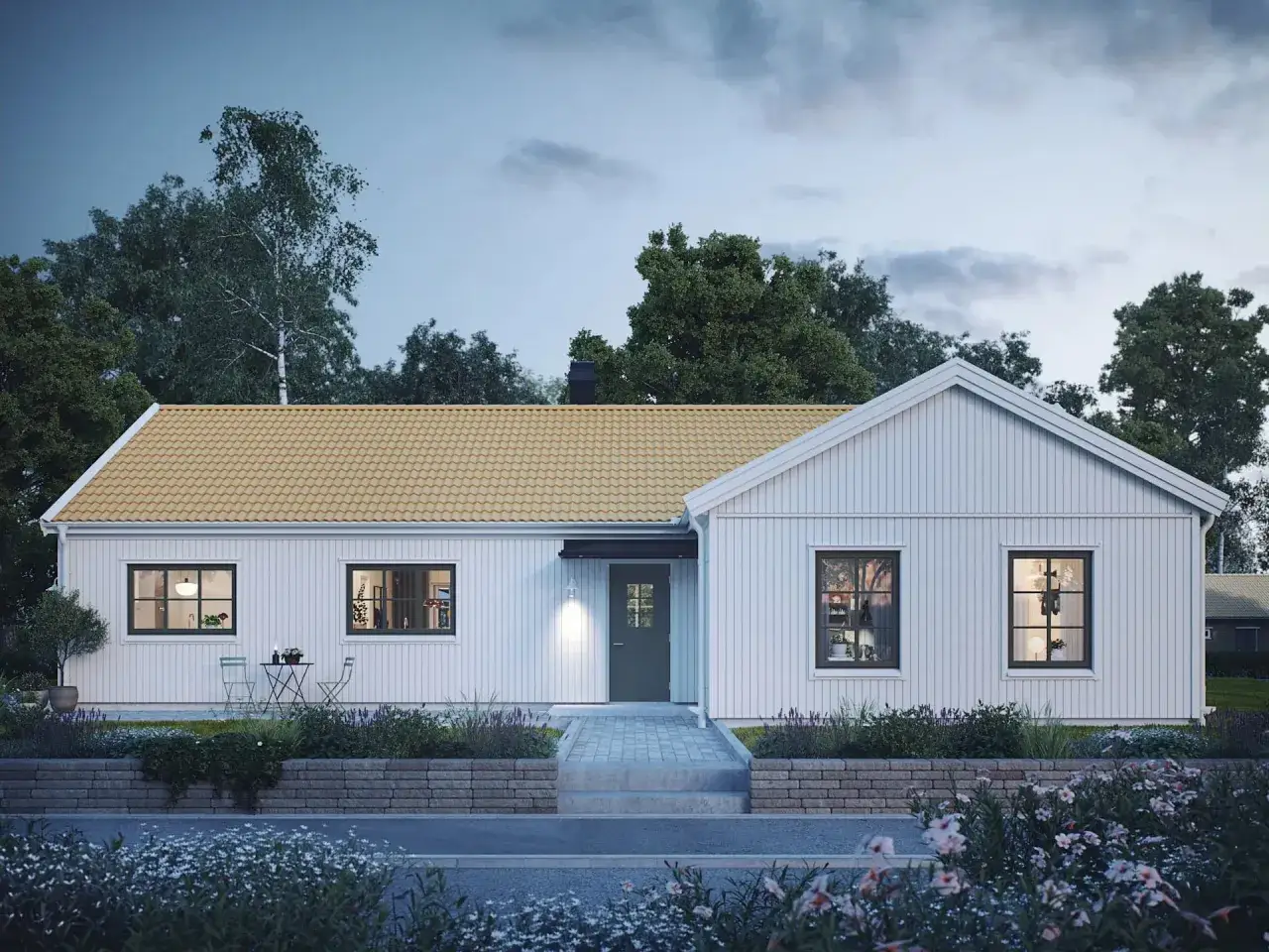 Vitt enplanshus med gul tegeltak och vacker trädgård. Drömmer du om att bygga hus? Pris och detaljer kan du hitta här.