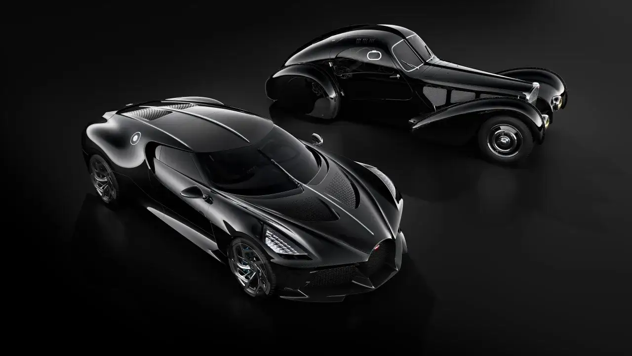 Dwa czarne Bugatti: nowoczesne La Voiture Noire i klasyczne. Zastanawiasz się, ile kosztuje Bugatti La Voiture Noire?