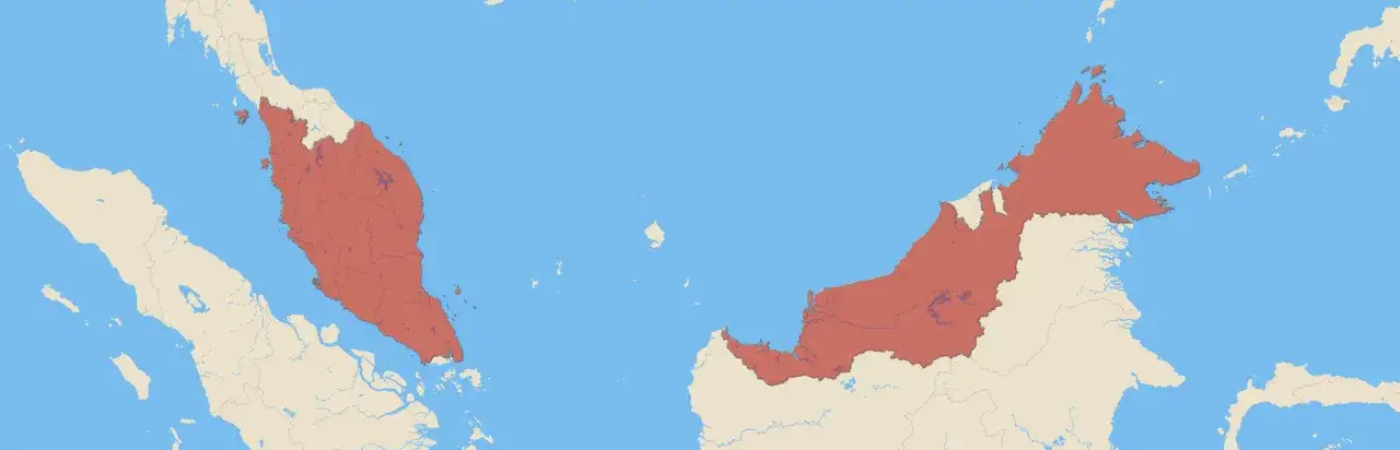 Mapa pokazuje, gdzie leży Malezja: na Półwyspie Malajskim i na wyspie Borneo, otoczona przez morza i inne kraje Azji Południowo-Wschodniej.