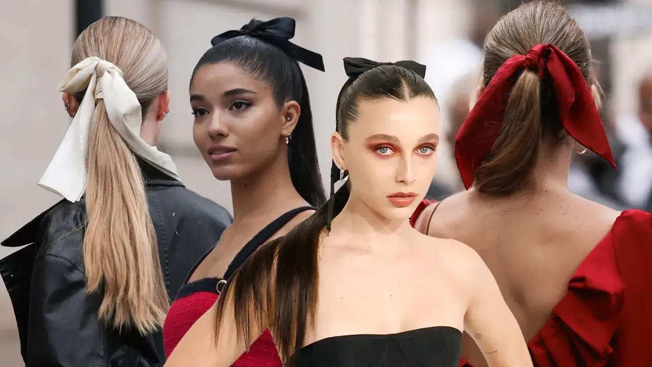 Coiffure avec nœud dans les cheveux : des queues de cheval ornées de rubans de soie blancs, noirs et rouges, ajoutant une touche d'élégance.