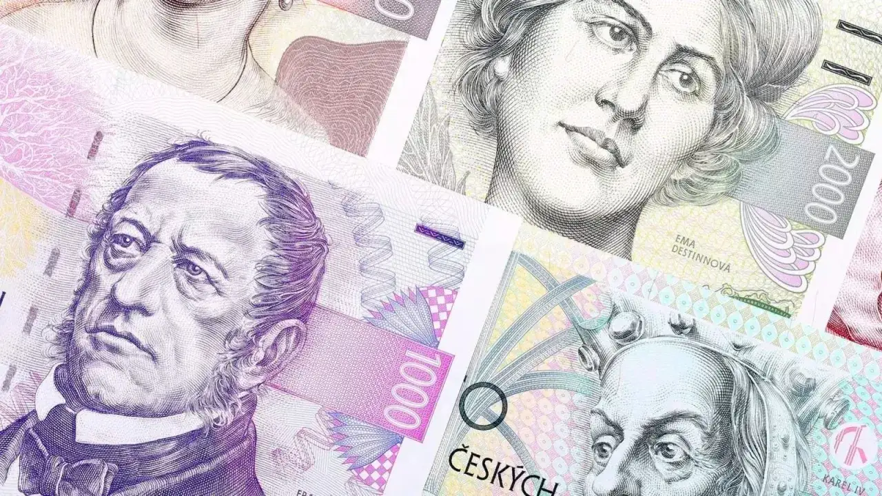 Portrety znanych postaci na banknotach. Widoczna waluta w Czechach: korony czeskie.