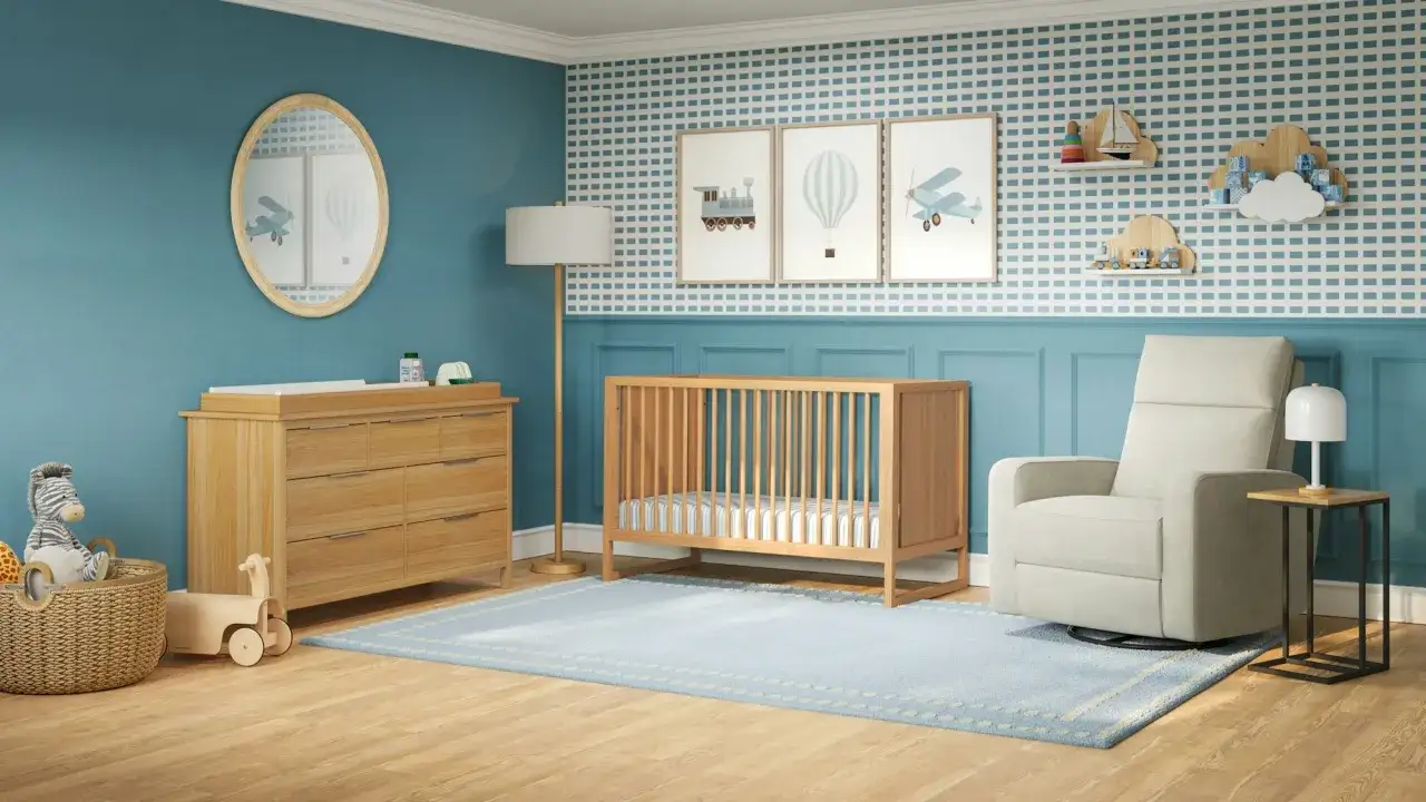 A nursery with a wooden crib, changing table, and glider. The crib's height is suitable for a baby.