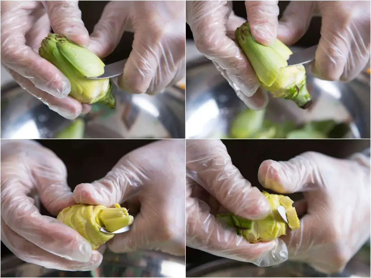 H&auml;nde mit Handschuhen schneiden Artischockenherzen f&uuml;r die Zubereitung. So isst man eine Artischocke: Schritt f&uuml;r Schritt.
