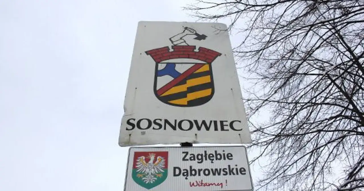 Znak graniczny Sosnowca z herbem miasta i napisem 