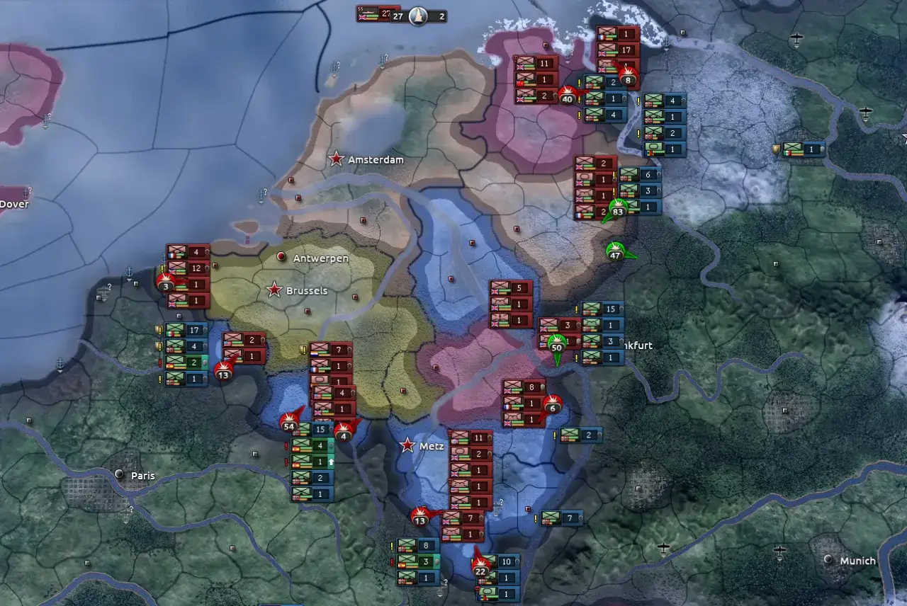 Bitwa o Beneluks w Hearts of Iron IV. Czerwone jednostki nacierają na zielone, szukając sposobu na obejście obrony. Może czas na hoi4 kody?