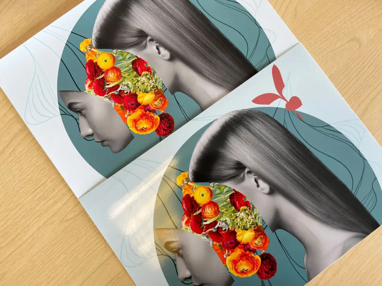 Dos impresiones art&iacute;sticas con rostros femeninos y flores vibrantes, sobre papel glossy que refleja la luz.