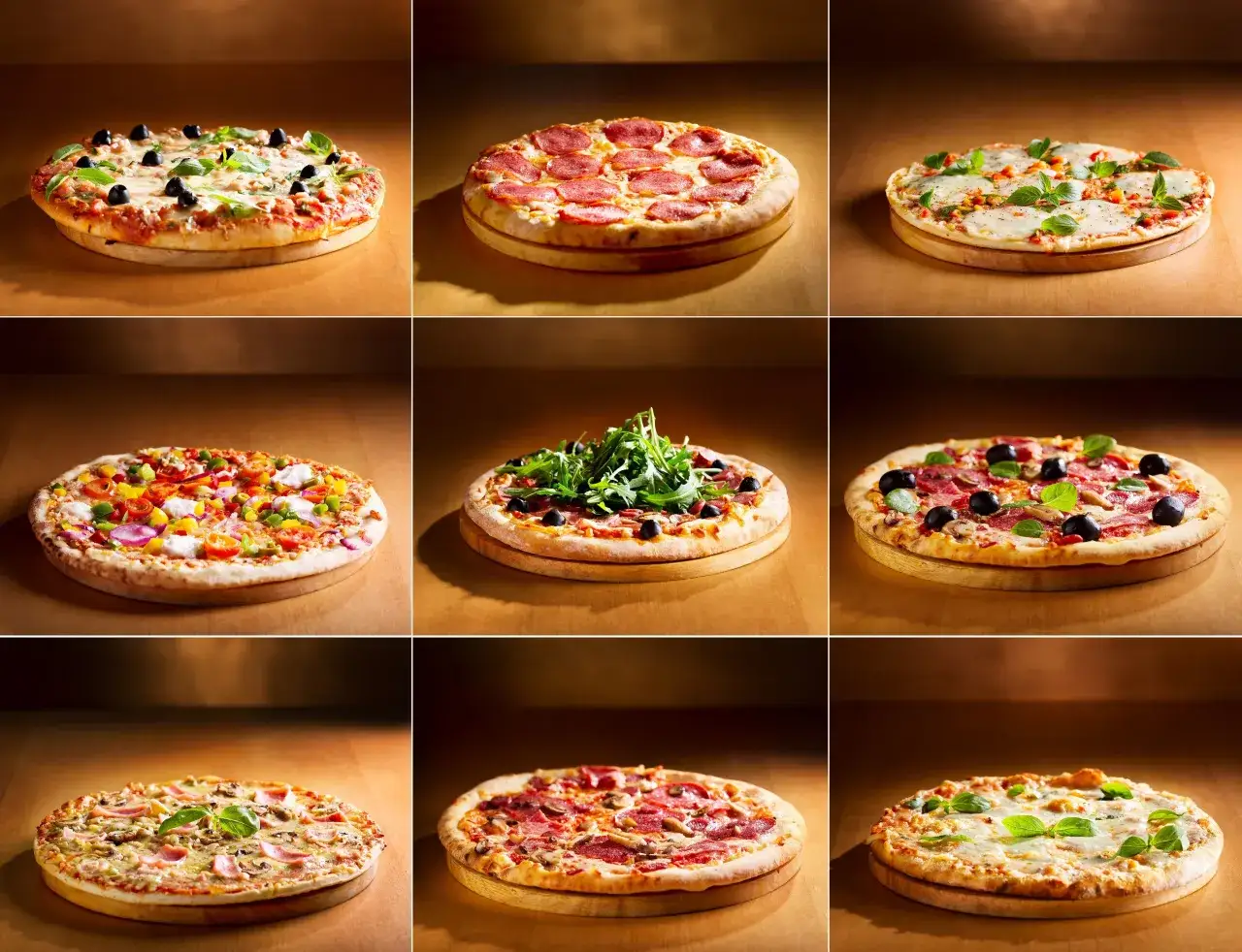 r&oacute;żne rodzaje pizzy na stole