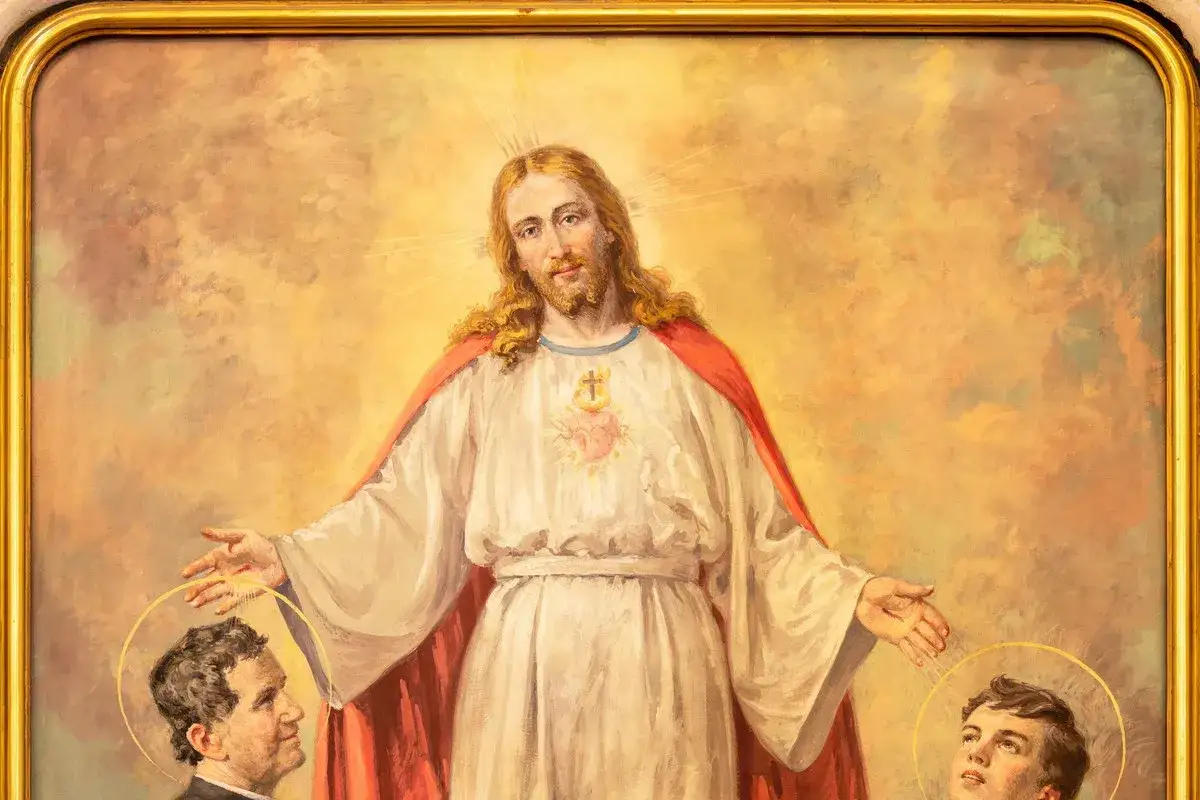 Jezus błogosławi młodego Dominika Savio i innego świętego.