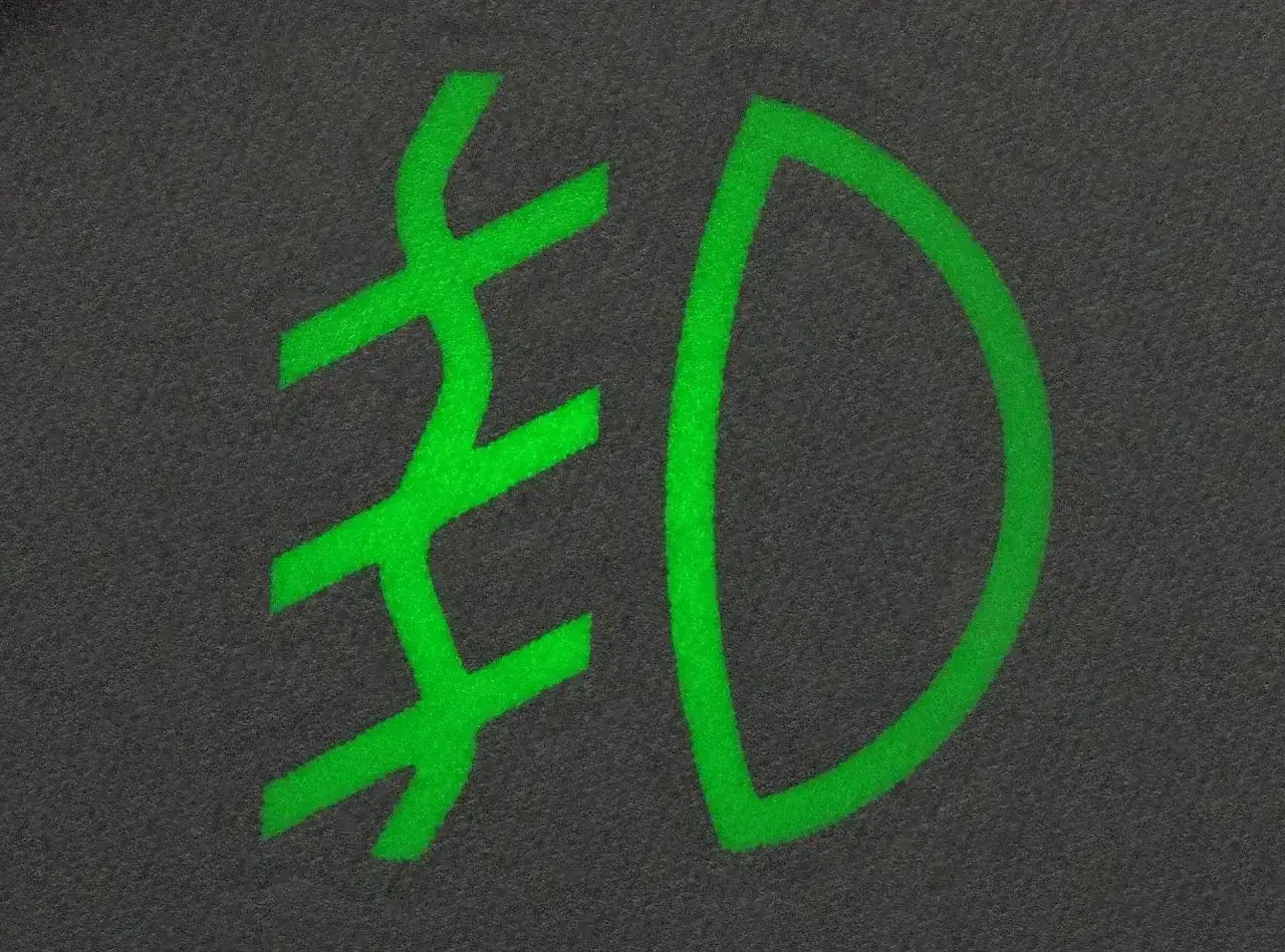 Zielony symbol na desce rozdzielczej: światła mijania znak.