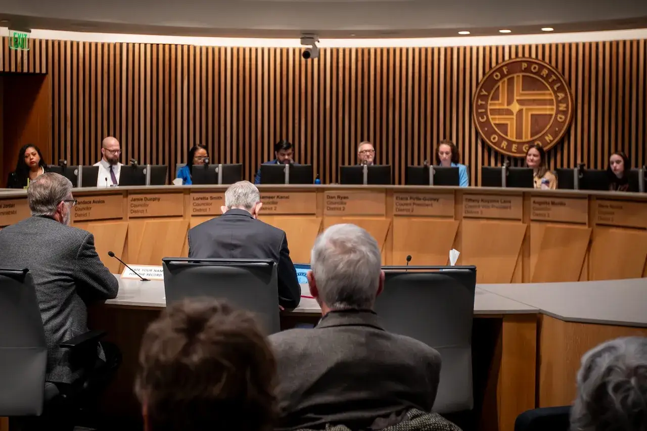 City council members at a meeting. Committee meeting minutes are available to the public.