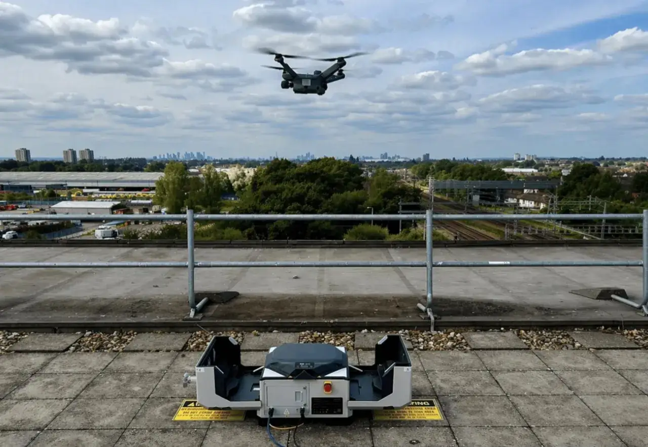 A drone takes flight from a rooftop, ready for its surveillance mission over a city skyline.