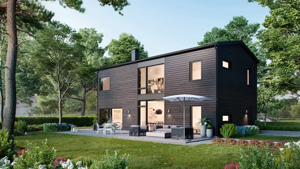 M&ouml;rkt modernt hus med stora f&ouml;nster och uteplats. Perfekt utbyggnad hus inspiration f&ouml;r en gr&ouml;nskande tr&auml;dg&aring;rd.