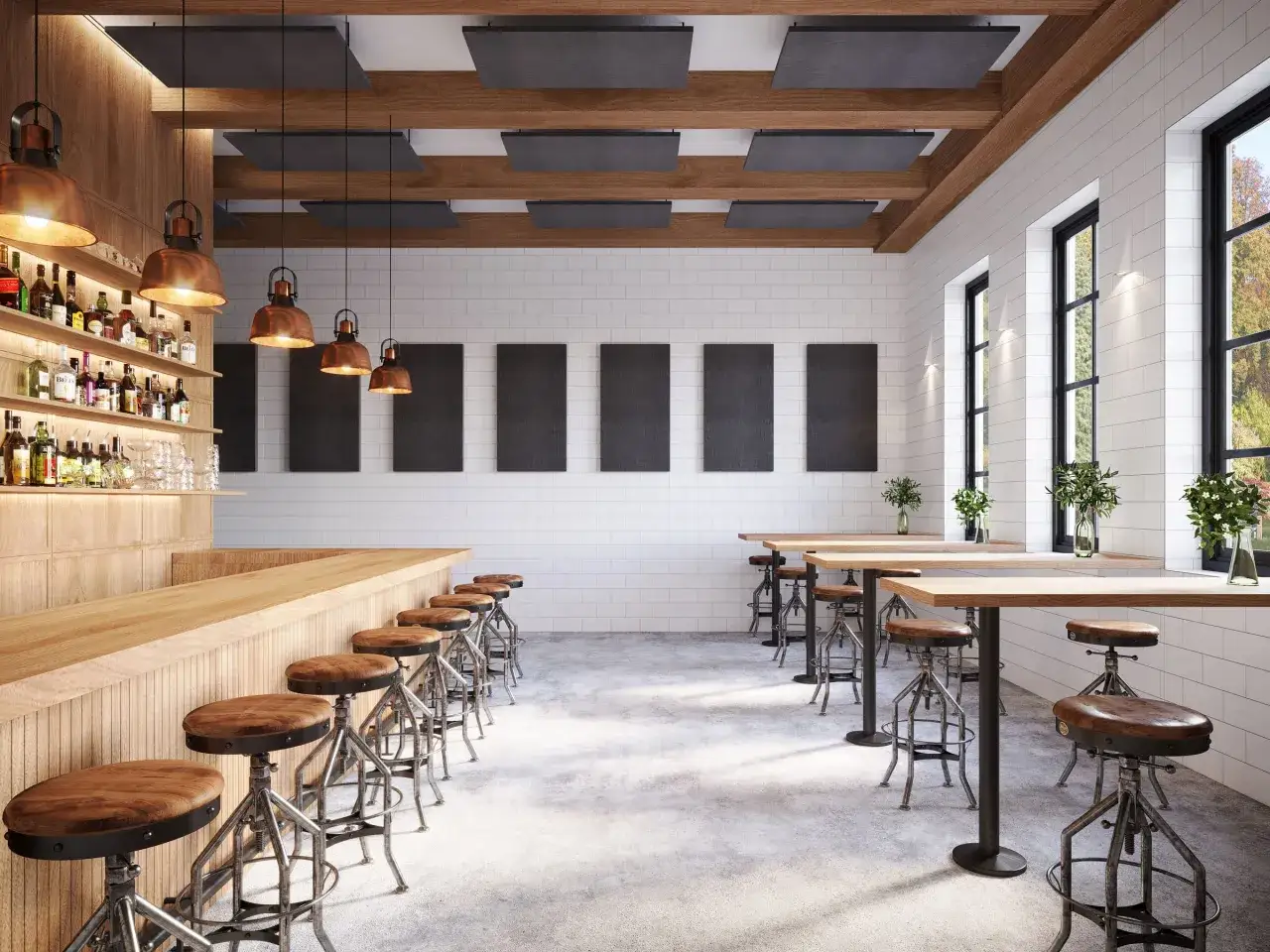 Barra de madera con taburetes, mesas altas y paneles ac&uacute;sticos en el techo para controlar el ruido del restaurante.