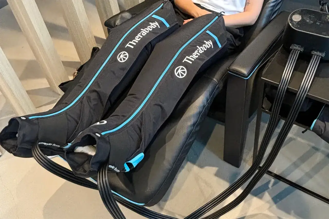 Person using Therabody compression boots. The frequency of use depends on individual needs, but daily use is common for recovery.