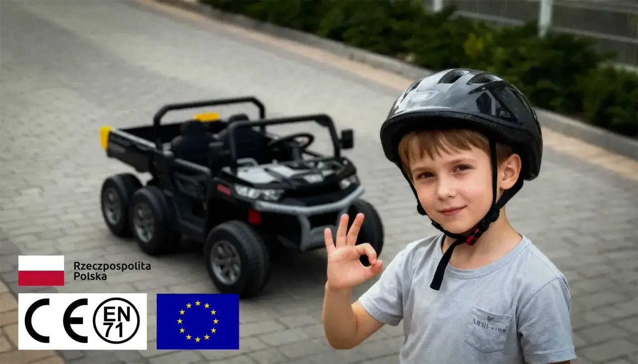 Chłopiec w kasku pokazuje znak 