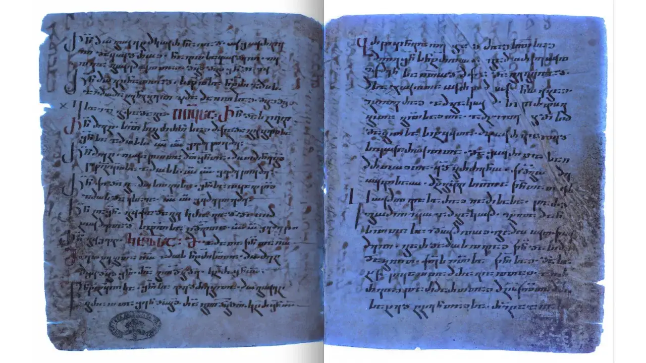 Ancient manuscript pages with script. This text may be related to who wrote the book of Matthew, a significant biblical text.