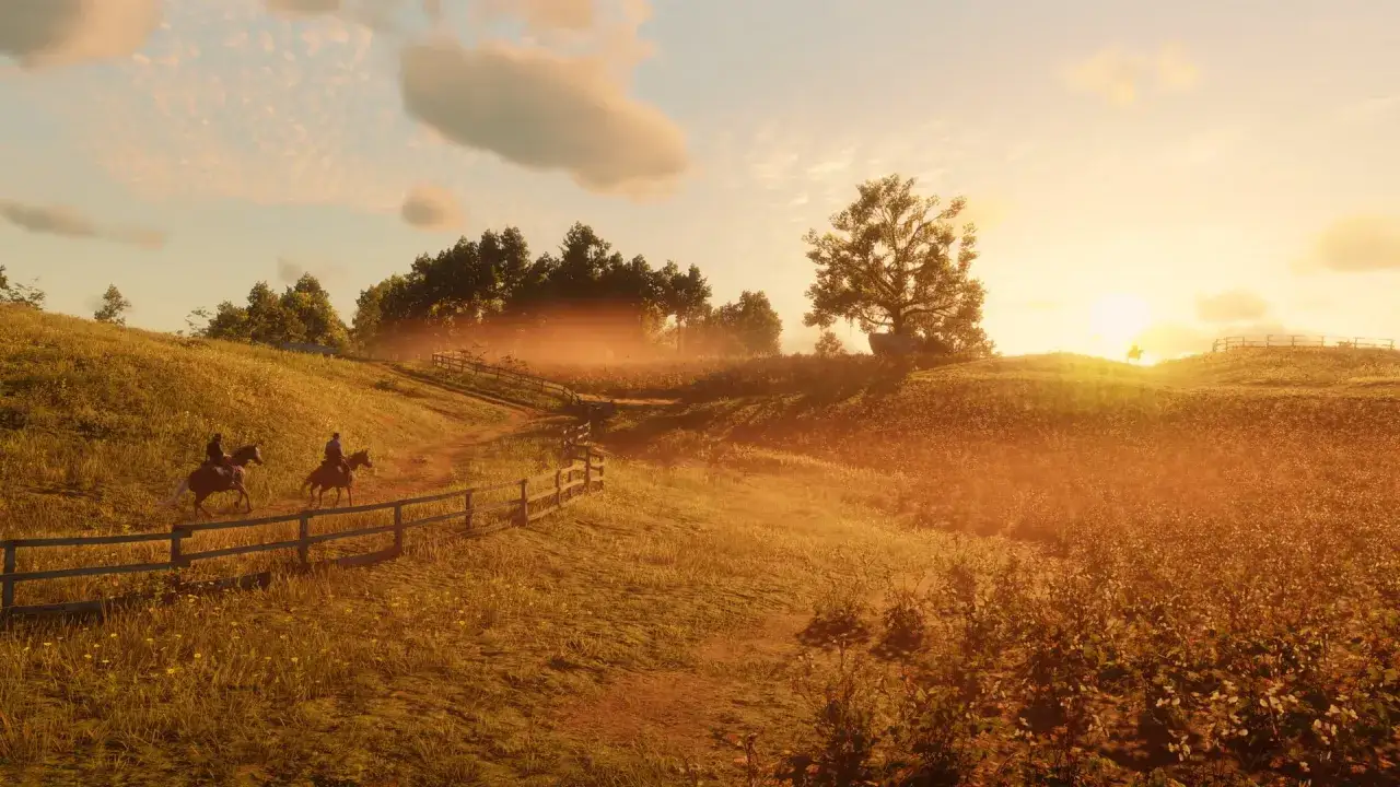 Zachód słońca nad prerii, dwaj jeźdźcy na koniach przemierzają malowniczą ścieżkę. Czy to zapowiedź **Red Dead Redemption 3 kiedy**?
