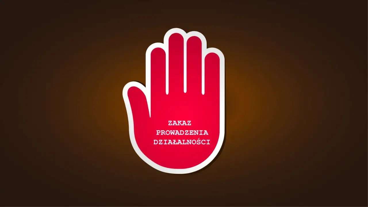 Czerwona dłoń z napisem 