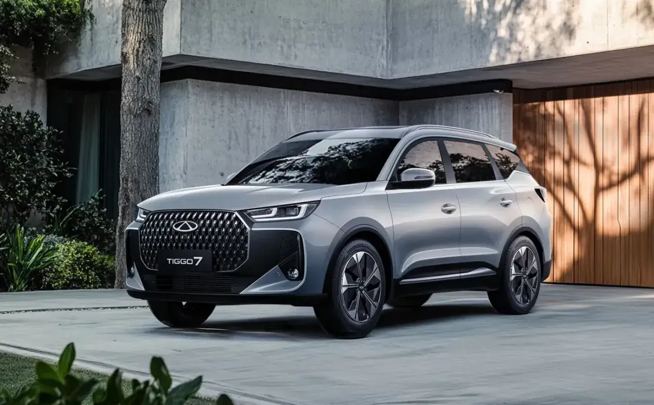 Nowy Chery Tiggo 7, elegancka marka samochodu na dziś, prezentuje się na tle nowoczesnej architektury i zieleni.