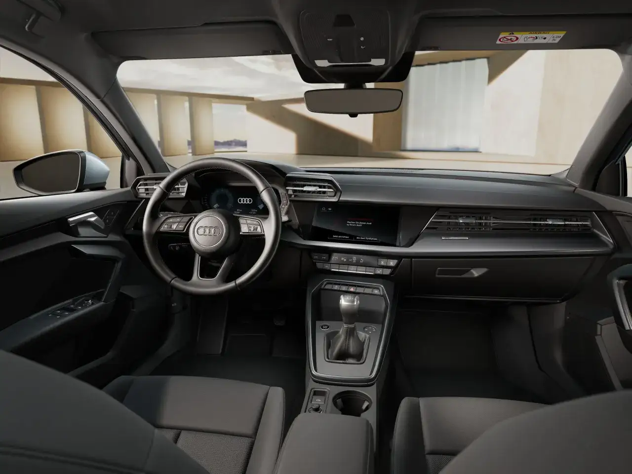 Interni moderni di audi modelli, con volante multifunzione, cruscotto digitale e cambio automatico.