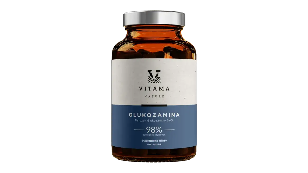 Szklana butelka z kapsułkami glukozaminy. Etykieta informuje o 98% substancji czynnej, co sugeruje wysoką jakość naturalnej glukozaminy.