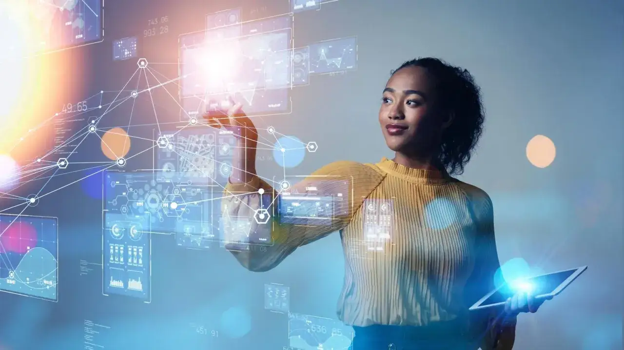 A woman interacts with a holographic interface, showcasing how AI employee engagement can visualize data and connect teams.