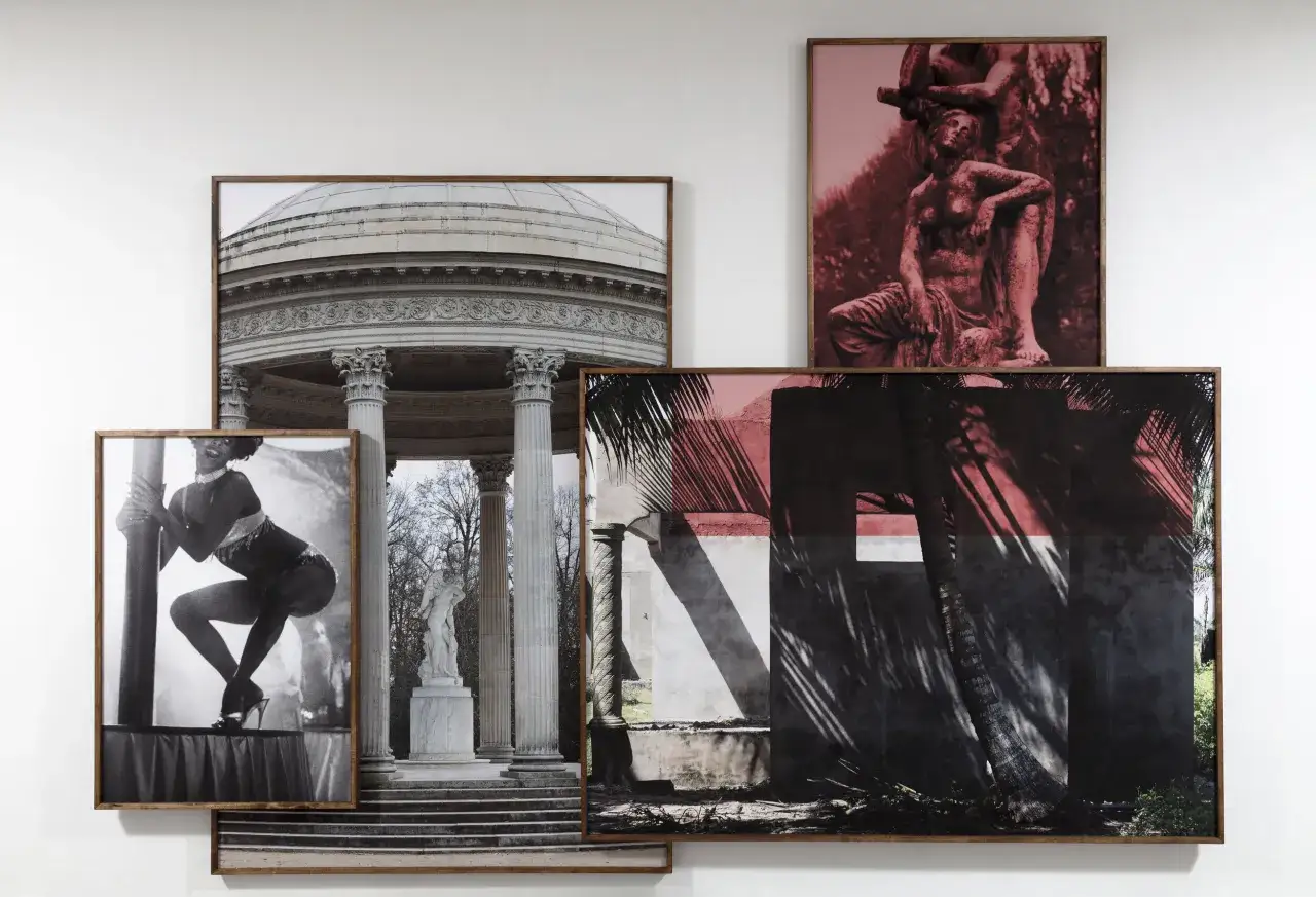 A striking collection of framed photographs at the david lewis gallery, featuring classical architecture, a dancer, and a sun-drenched, shadowed facade.